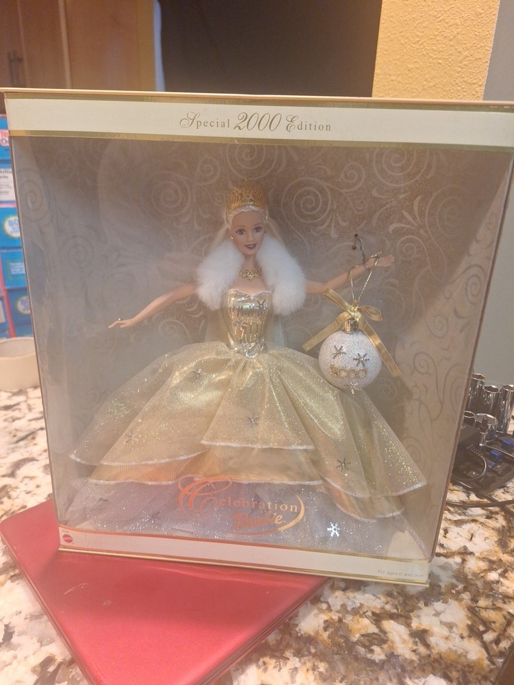 Special 2000 edition celebration barbie 28269.  NEVER OPENED!!