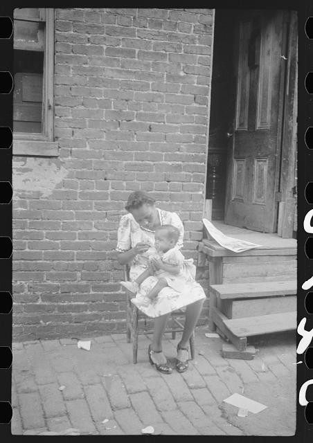 Photo:Washington DC 1941 Mother and Child Alley Dwelling Brick Row House