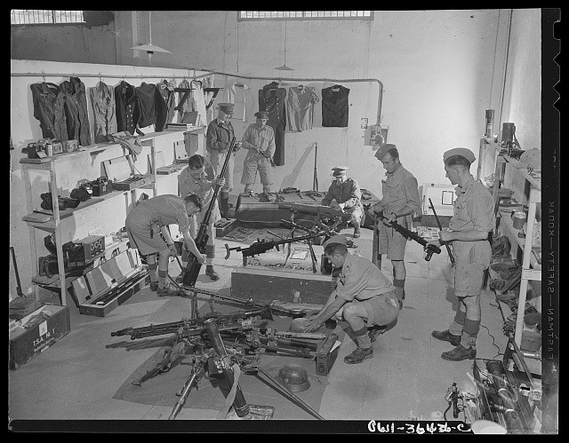 Photo:World War II Army Soldiers Machine Guns Uniforms Barracks 1940s