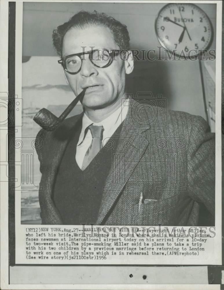 1956 Press Photo Playwright Arthur Miller faces newsmen at airport in New York