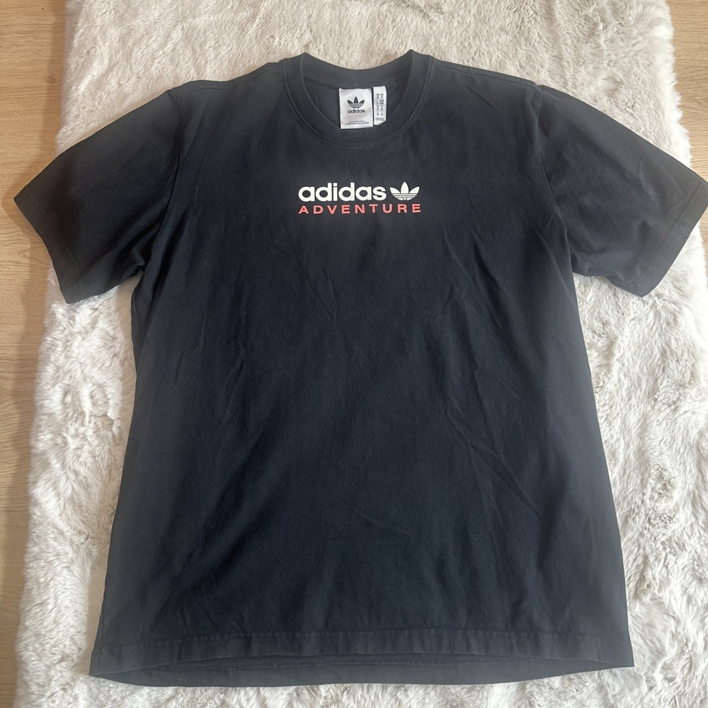 Adidas Adventure men’s black graphic t-shirt with Trefoil logo on chest.Size M