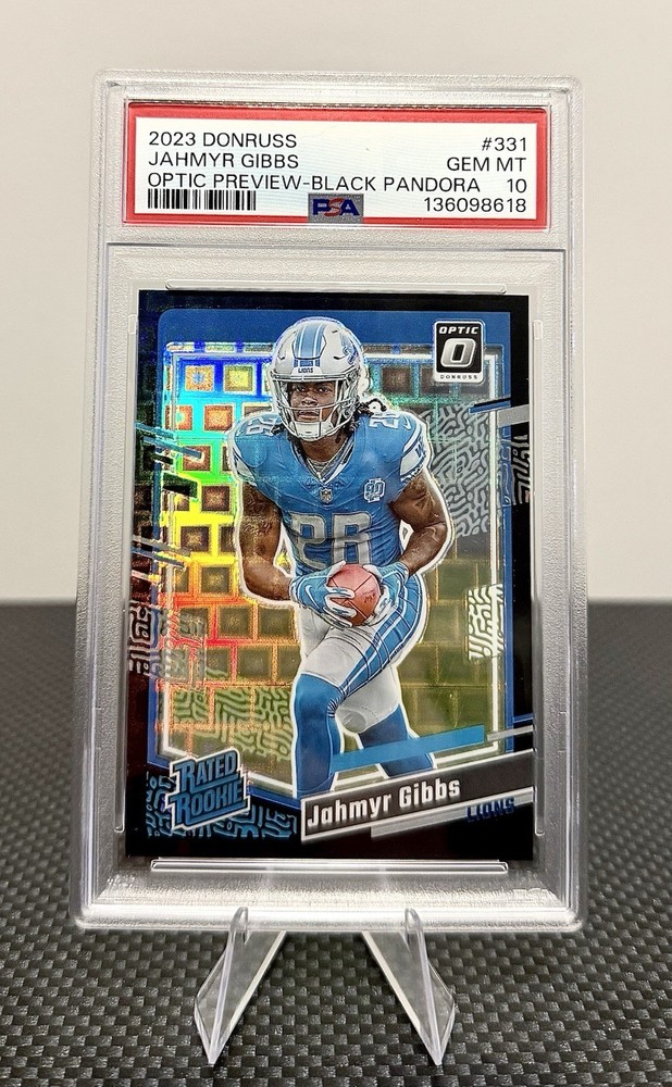 🦁💎2023 Panini Donruss Optic Jahmyr Gibbs Black Pandora Prizm /25 RC PSA 10🦁💎