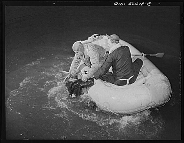 Photo:WWII 1940s Men in Inflatable Boat Rescue at Sea