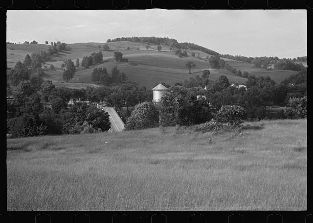 Photo:1930s Rural Hillside Landscape Water Tower Road Trees