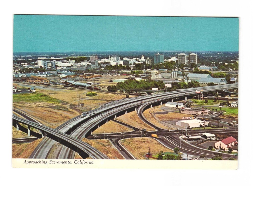 Approaching Sacramento CA aerial view of freeways vintage postcard unposted