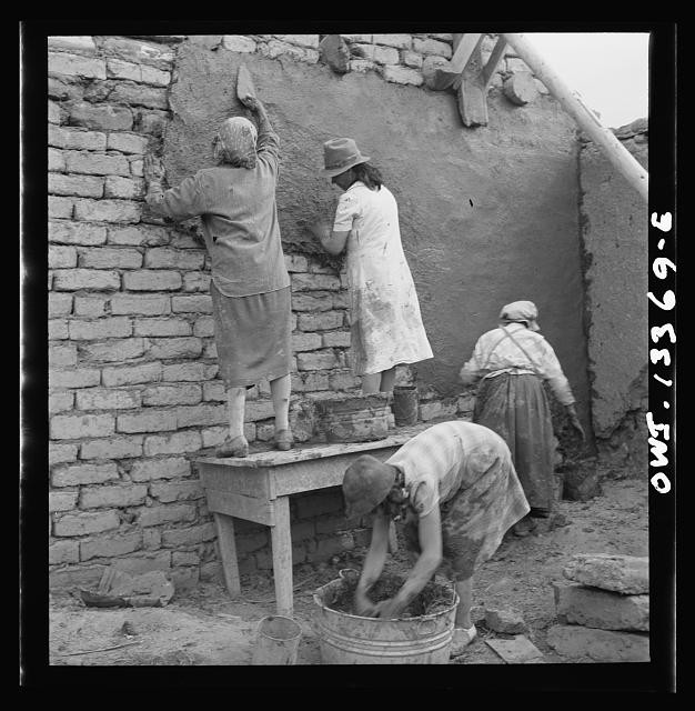 Photo:Women Plastering Adobe Wall 1930s Construction