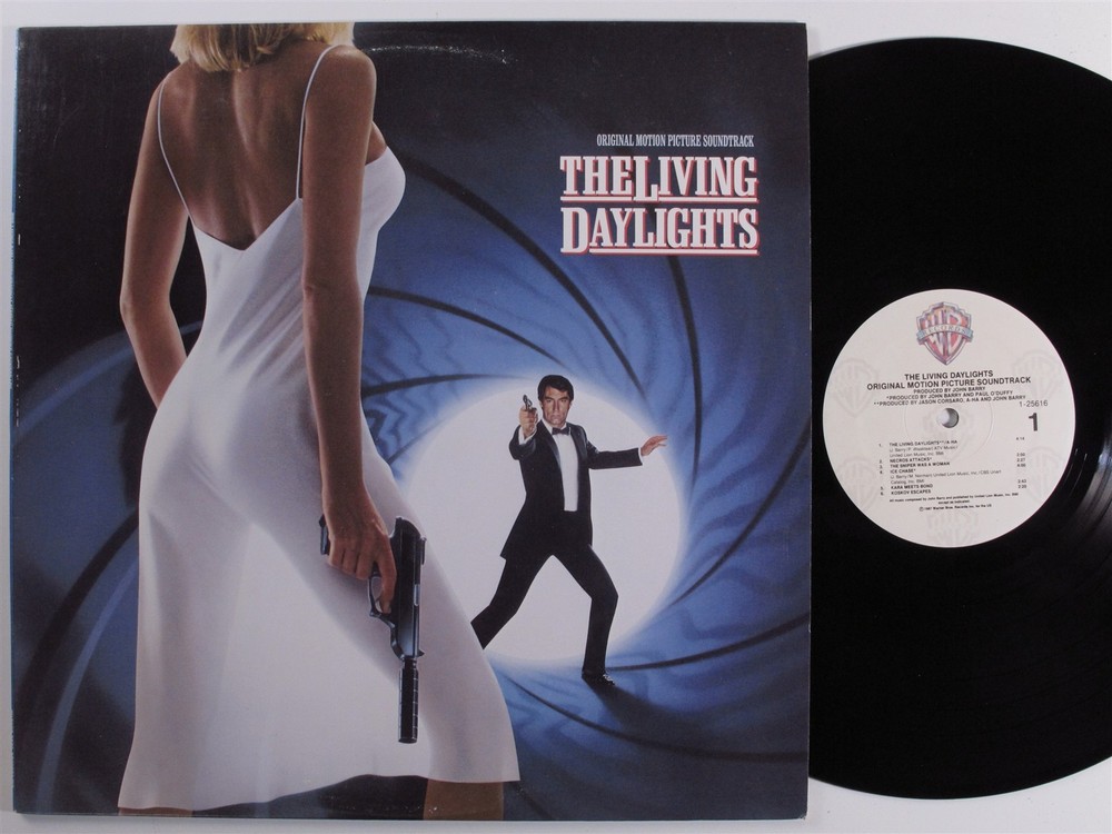 LIVING DAYLIGHTS OST John Barry/A-Ha/Pretenders WARNER BROS LP VG+/VG++ d