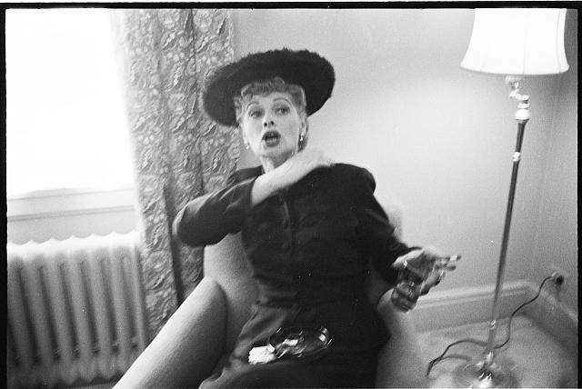 Photo:Lucy Comes Home 1950s Lucille Ball Black Dress Hat Candid Portrait