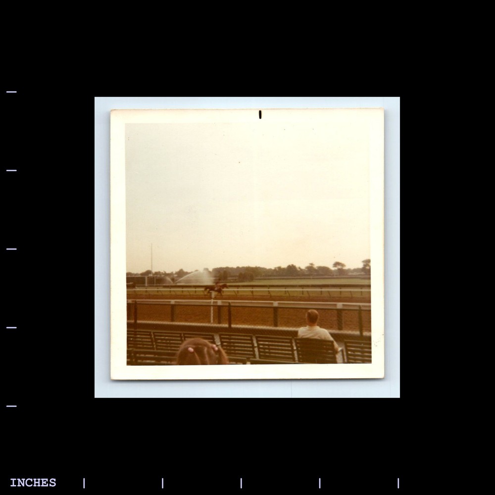 Square Color Photo MAN WATCHING HORSE ON RACETRACK 1971