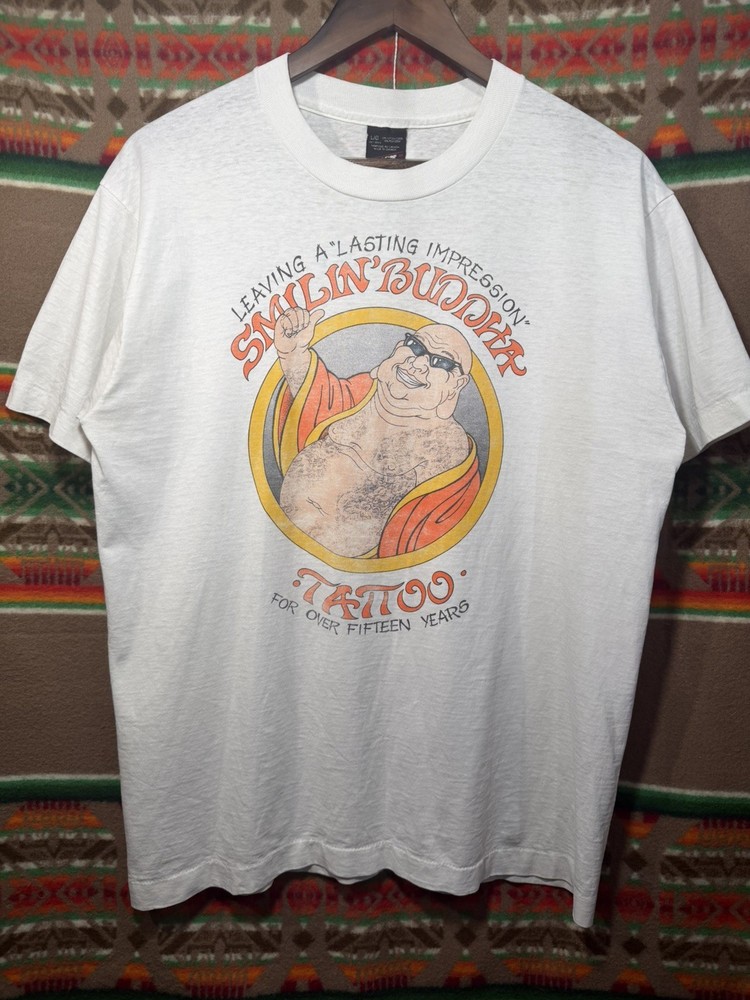 Vintage 90’s Tattoo Shirt smiling Buddha obscure faded and worn in L