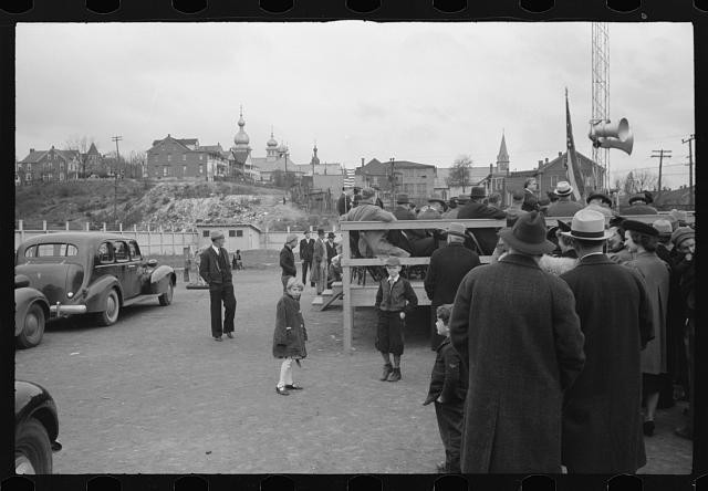 Photo:1930s Street Scene Crowd Cars Church Spires Unknown Location