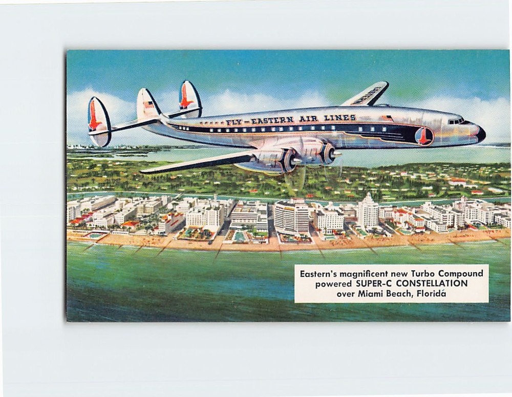 Postcard Easterns Super C Constellation over Miami Beach Florida USA