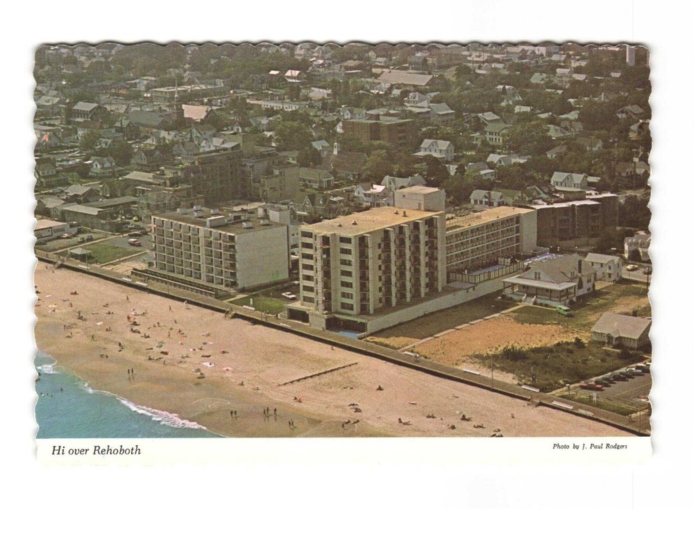 Hi over REHOBOTH All the action is on the beach vintage postcard unposted