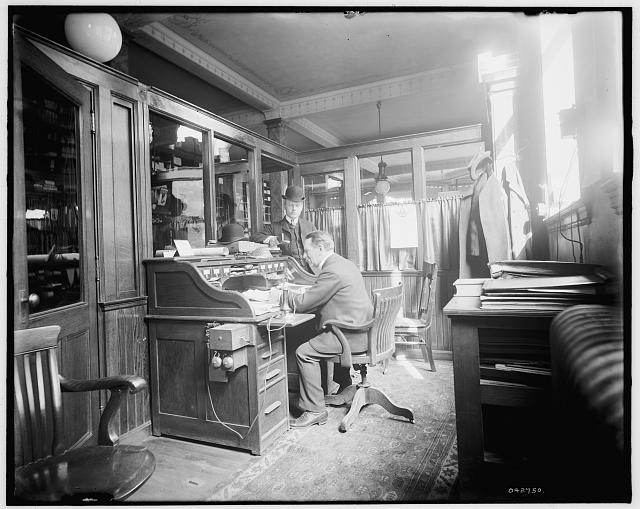 Photo:Detroit Mich Richmond Backus Co office 1902 desk clerk interior