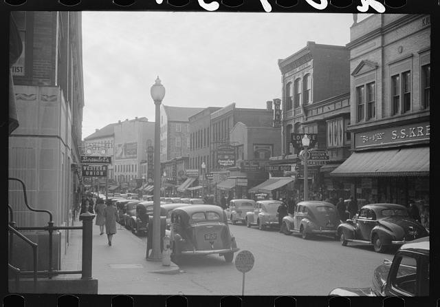 Photo:Downtown Street Scene 1930s Cars Storefronts Main Street