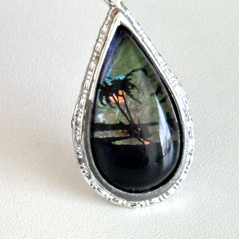 Vintage Silver Teardrop Pendant with Tropical Butterfly & Palm Tree Design