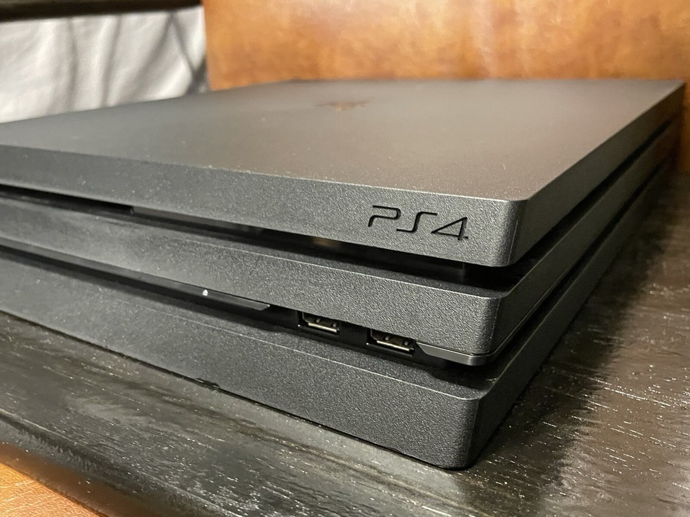 PS4 PRO 1TB w/ Red Camo Controller And 10 Games