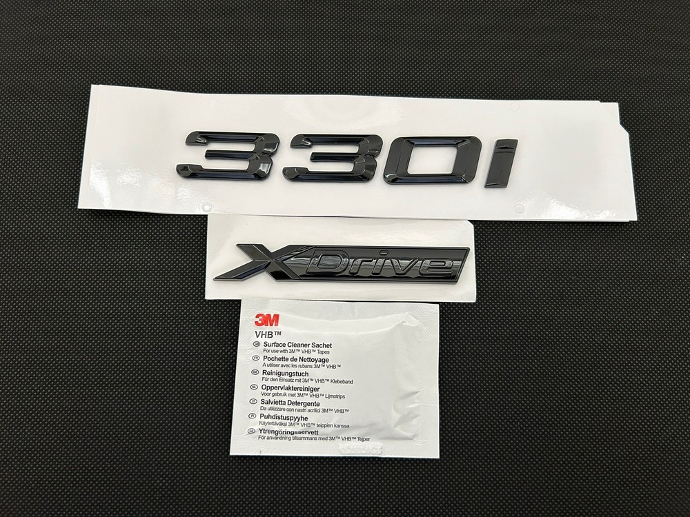BMW 330i + Xdrive BADGE  IN GLOSS BLACK. FREE ALCOHOL WIPE