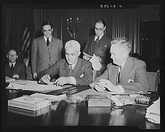 Photo:Harry S Truman Signing Document Washington DC 1940s Men at Desk