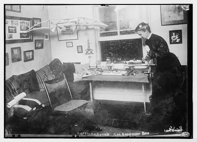 Photo:Miss E. H. Dodd in room various aeronautical displays,1907