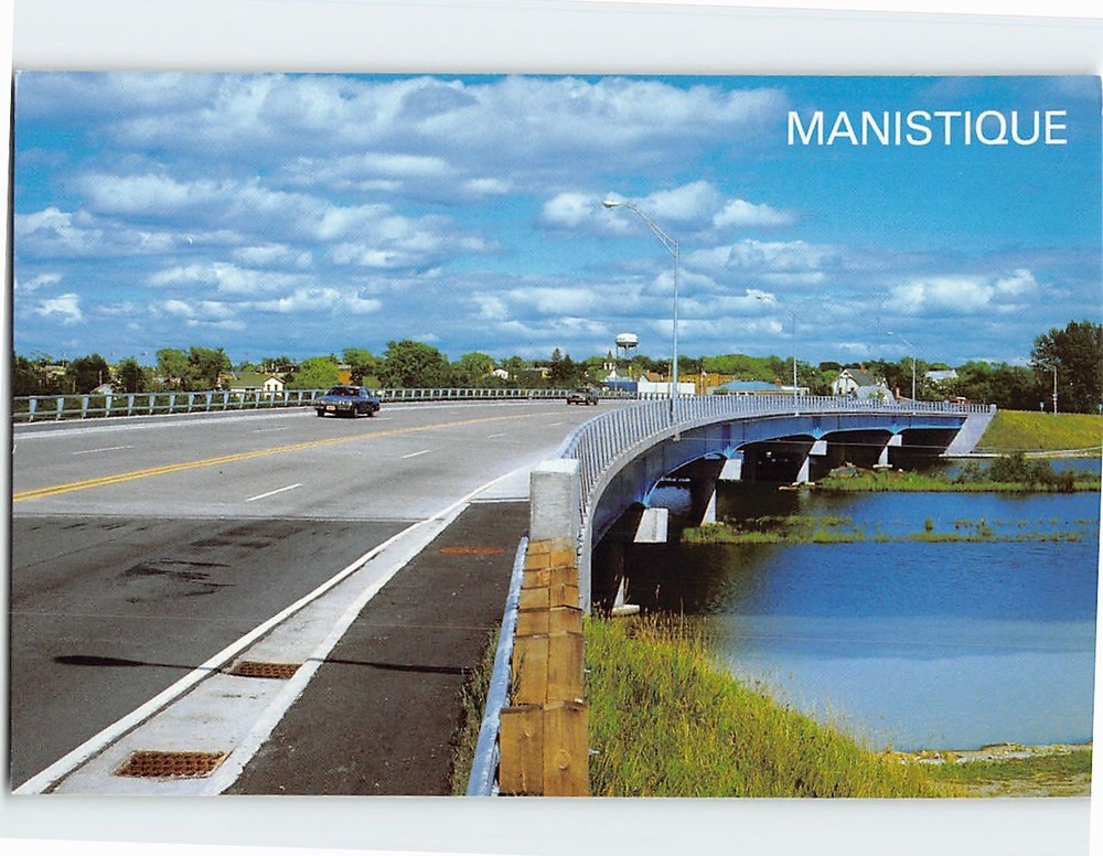 Postcard Highway US 2 crosses the Manistique River Manistique Michigan USA