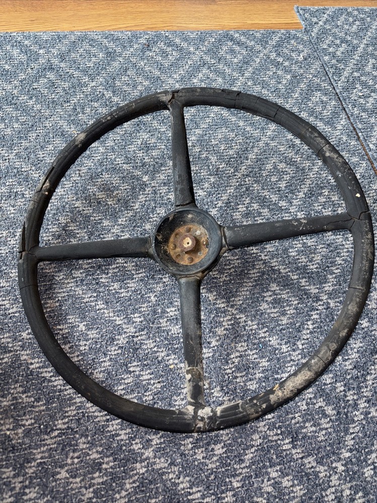 1938 Ford Truck  steering wheel With Nut & Partial Steering Shaft.       Clock?