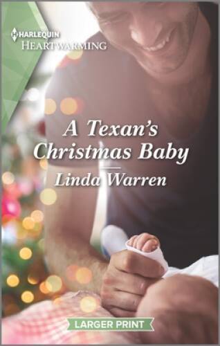 A Texan's Christmas Baby (Texas Rebels, 11) - Mass Market Paperback - GOOD