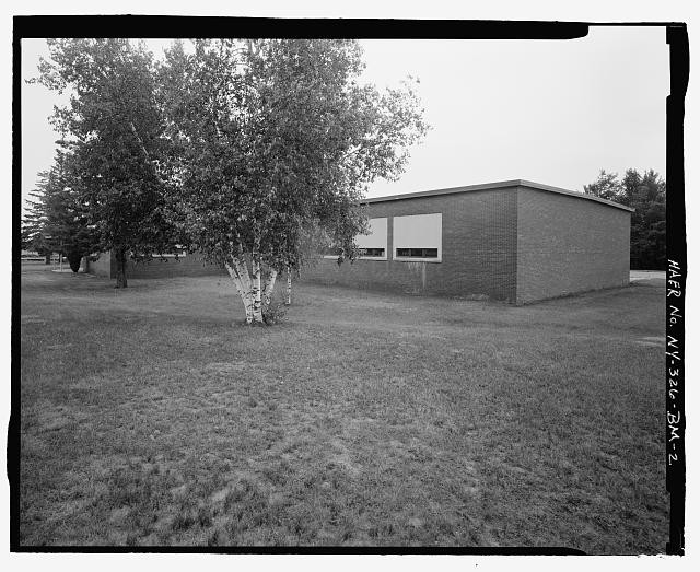 WEST FRONT AND SOUTH SIDE ELEVATIONS OF BUILDING. VIEW TO EAST - Plattsburgh