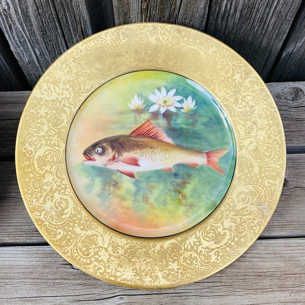 A set of 3 Antique Gold Encrusted Limoges Fish Plates Charges