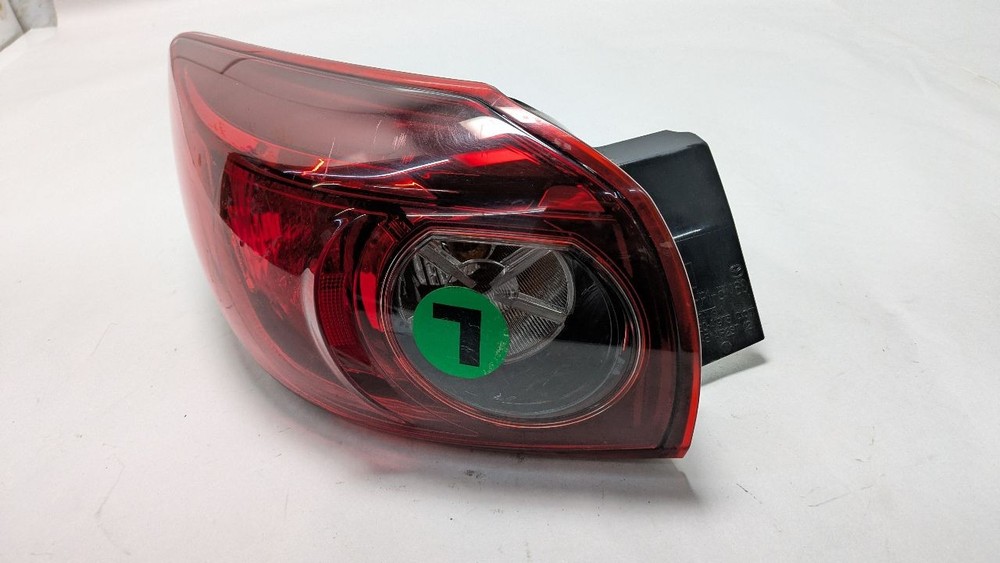 Used Left Tail Light Assembly fits: 2015 Mazda 3 Hatchback quarter panel mountedCheck the pictures and seller’s note for full details
