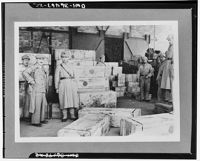 Photo:World War II Soldiers with Crates 1940s Warehouse Loading Dock