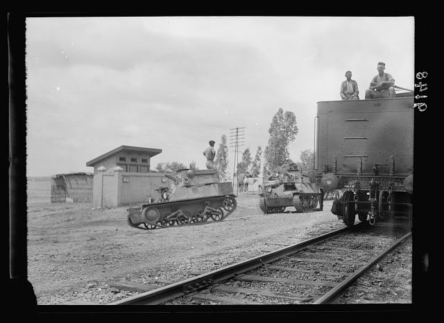 Photo:Palestine disturbances 1936. Armoured tanks escorting trains