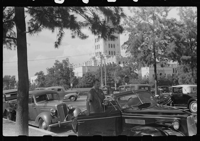 Photo:1930s City Street Convertible Cars Office Building Man Standing
