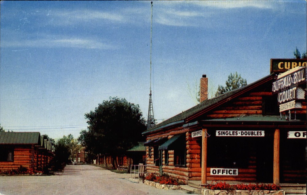Buffalo Bill Court ~ Cody Wyoming WY ~ log cabins ~ 1950s postcard