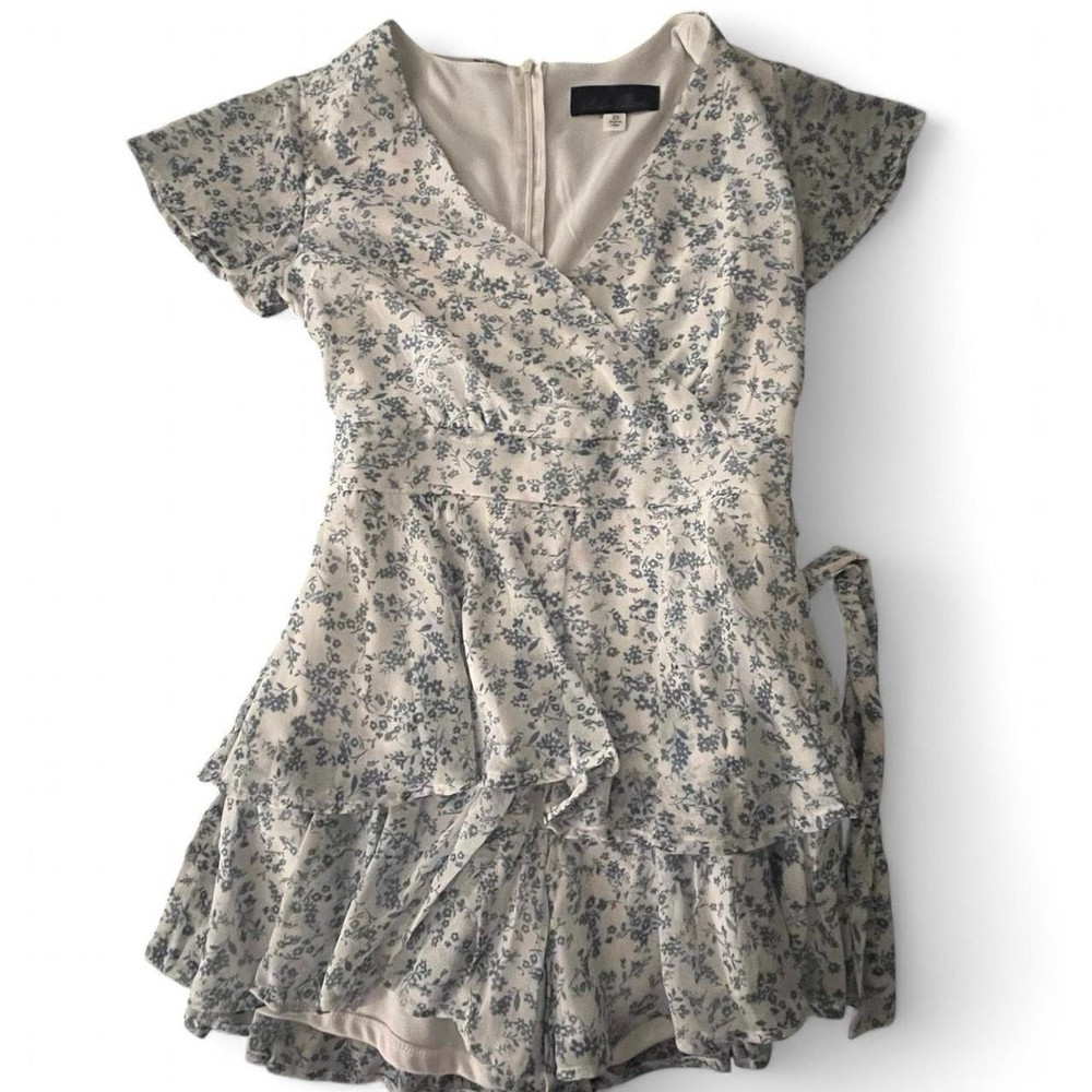 Blue Rain XS Floral Romper white Blue Short Sleeve Ruffle Tie back V-Neck Zip