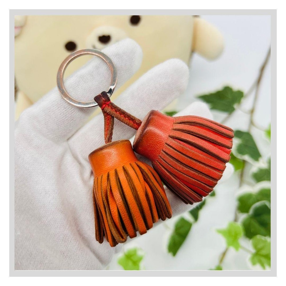 Hermes Carmen Unodus Charm Orange Leather Keychain Accessory