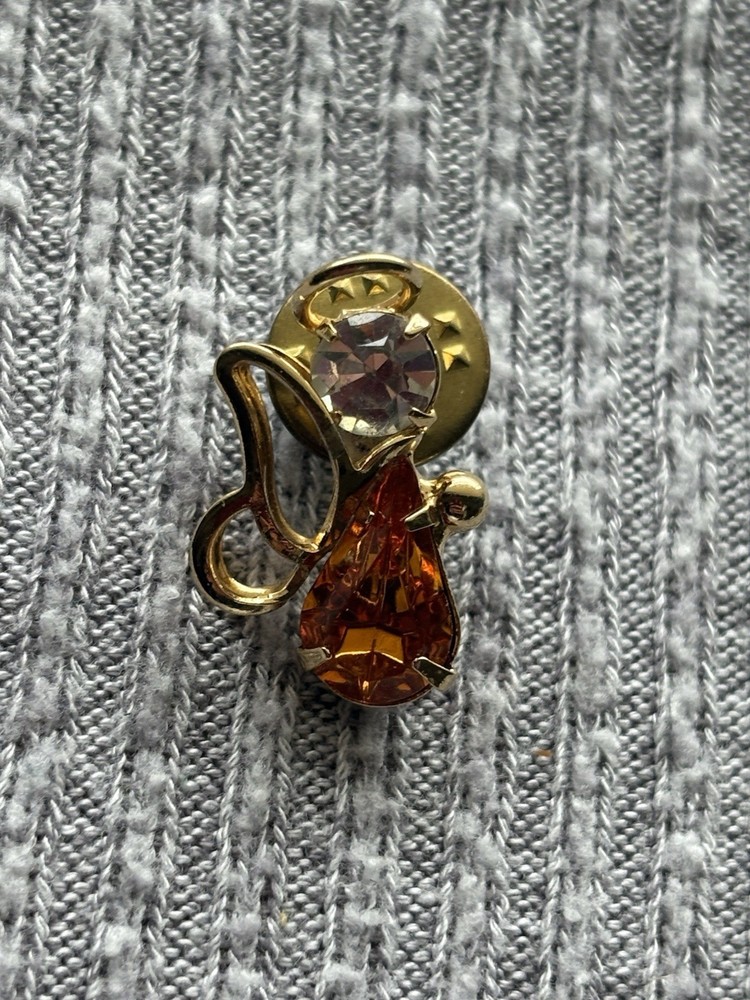 Vintage gold tone orange & clear rhinestone angel lapel pin