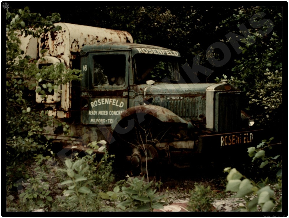 Mack Trucks New Metal Sign: 1974 Rosenfeld Concrete Truck on Blocks in Woods