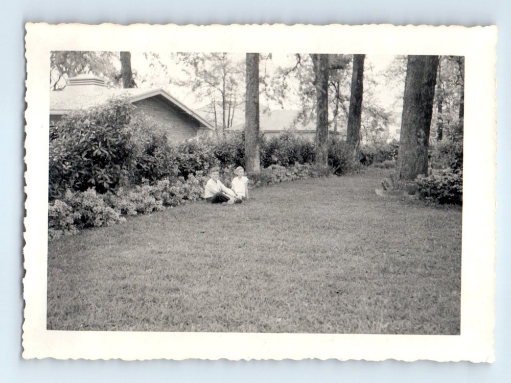 Old Vintage Photo PAIR BOYS SITTING ON GRASS LAWN BACKYARD OF HOUSE SNAPSHOT