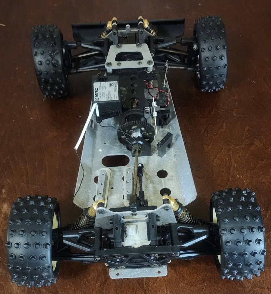 KYOSHO BURNS 1987 CHASSIS, SOLD FOR PARTS OR? LOADED WITH QUALITY PARTS! NICE!