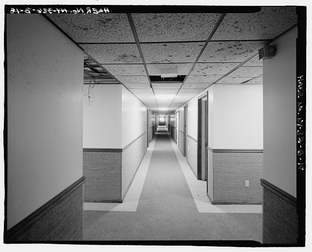 INTERIOR OF CENTRAL CORRIDOR. view TO NORTHWEST - Plattsburgh Air Force Base,