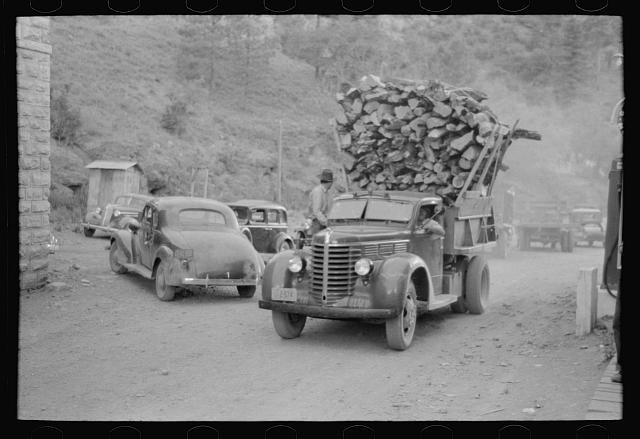 Photo:1930s Logging Truck Loaded with Wood on Rural Road Cars