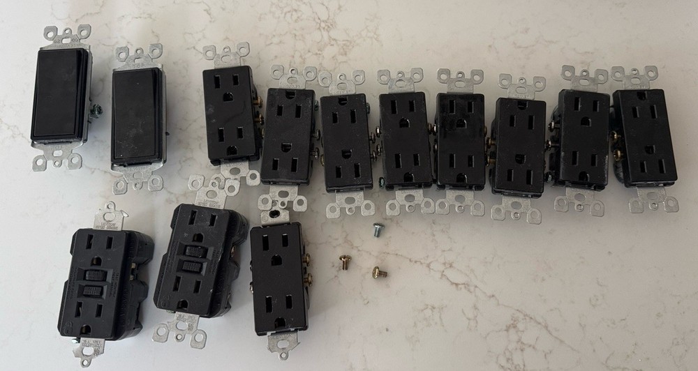 Lot Of Black Leviton Decora Outlets And Switches And Covers