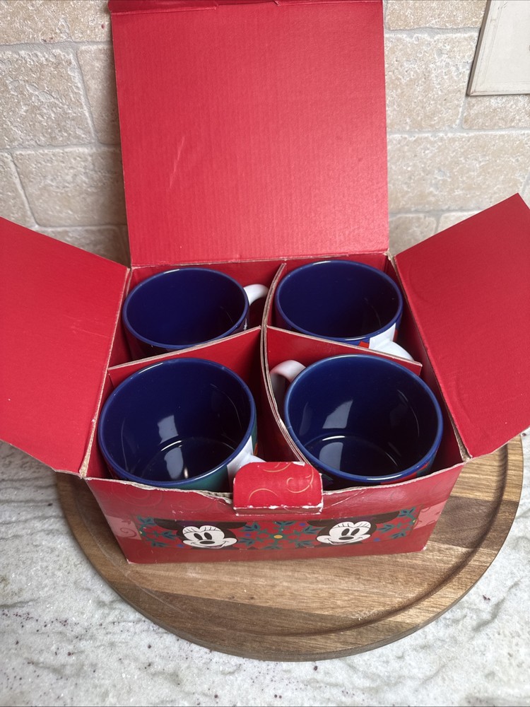 Set of 4 Mugs Disney Store An Enchanted Christmas Mickey Minnie Goofy Pluto 12oz