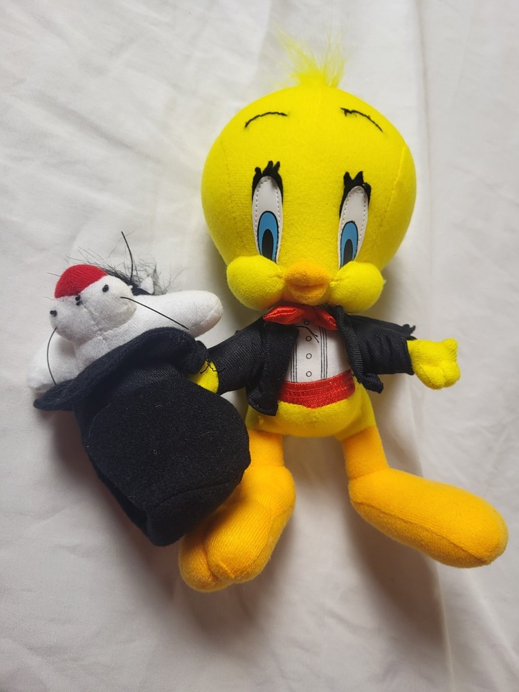 Vintage 1998 Warner Bros. Looney Tunes Tweety Bird and Sylvester Magician plush.