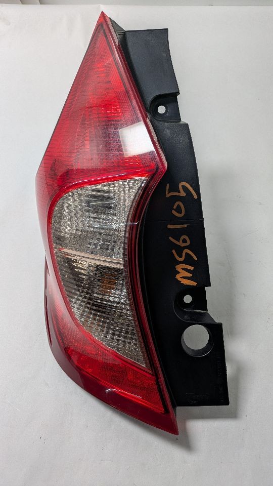 Used Left Tail Light Assembly fits: 2019 Nissan Versa quarter panel mounted Htbk