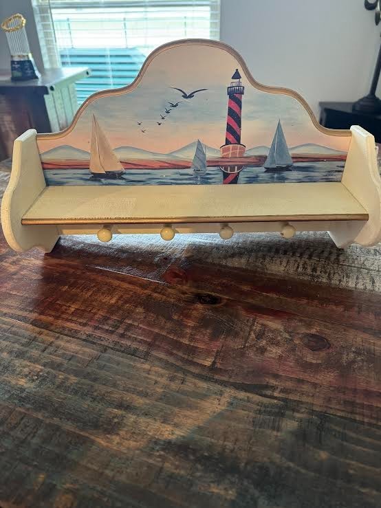 Vintage Coastal Wall Shelf featuring a Nautical Scene with a Lighthouse and Sail