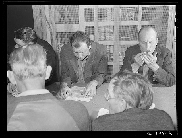 Visalia California 1940 Tulare Migrant Camp Council Meeting Men Reading