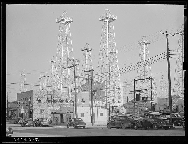 Photo:Kilgore Texas 1939 Downtown with Oil Derricks Cars Main Street