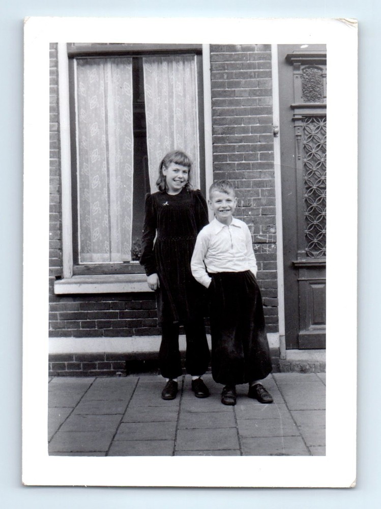 Old Vintage Photo TEEN GIRL AND BOY STANDING OUTSIDE WINDOW OF HOUSE SNAPSHOT